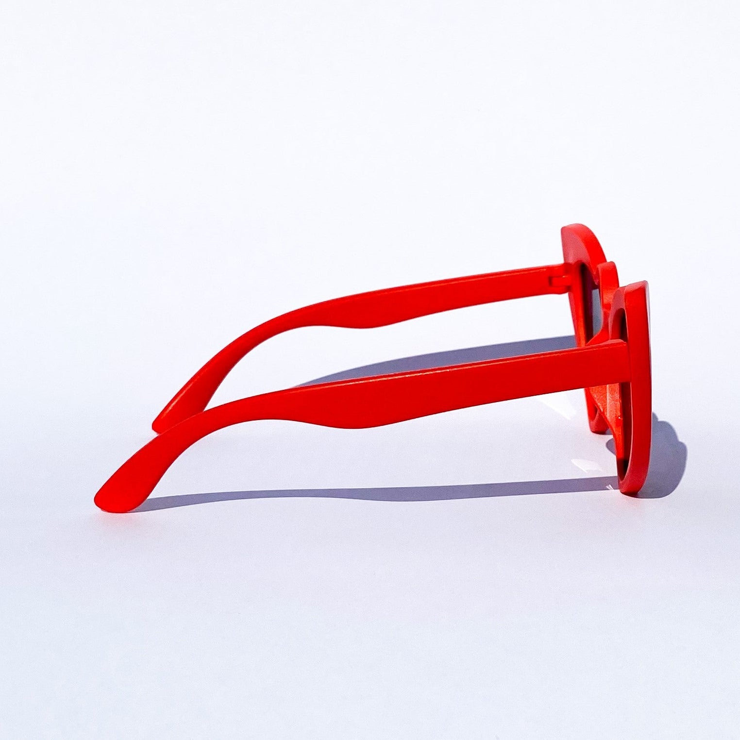 Ladybug round kids sunglasses with a chunky-profile frame and dark lenses for a playful and durable everyday look - Party People