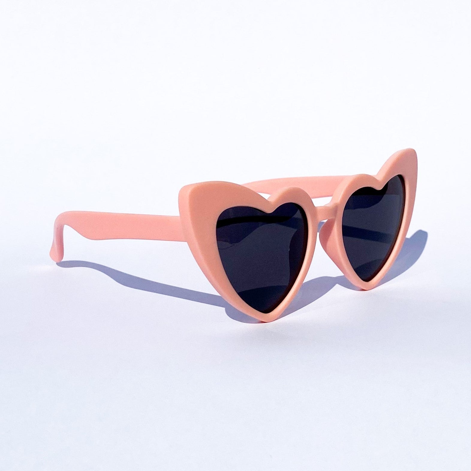 Ladybug round kids sunglasses with a chunky-profile frame and dark lenses for a playful and durable everyday look - Party People