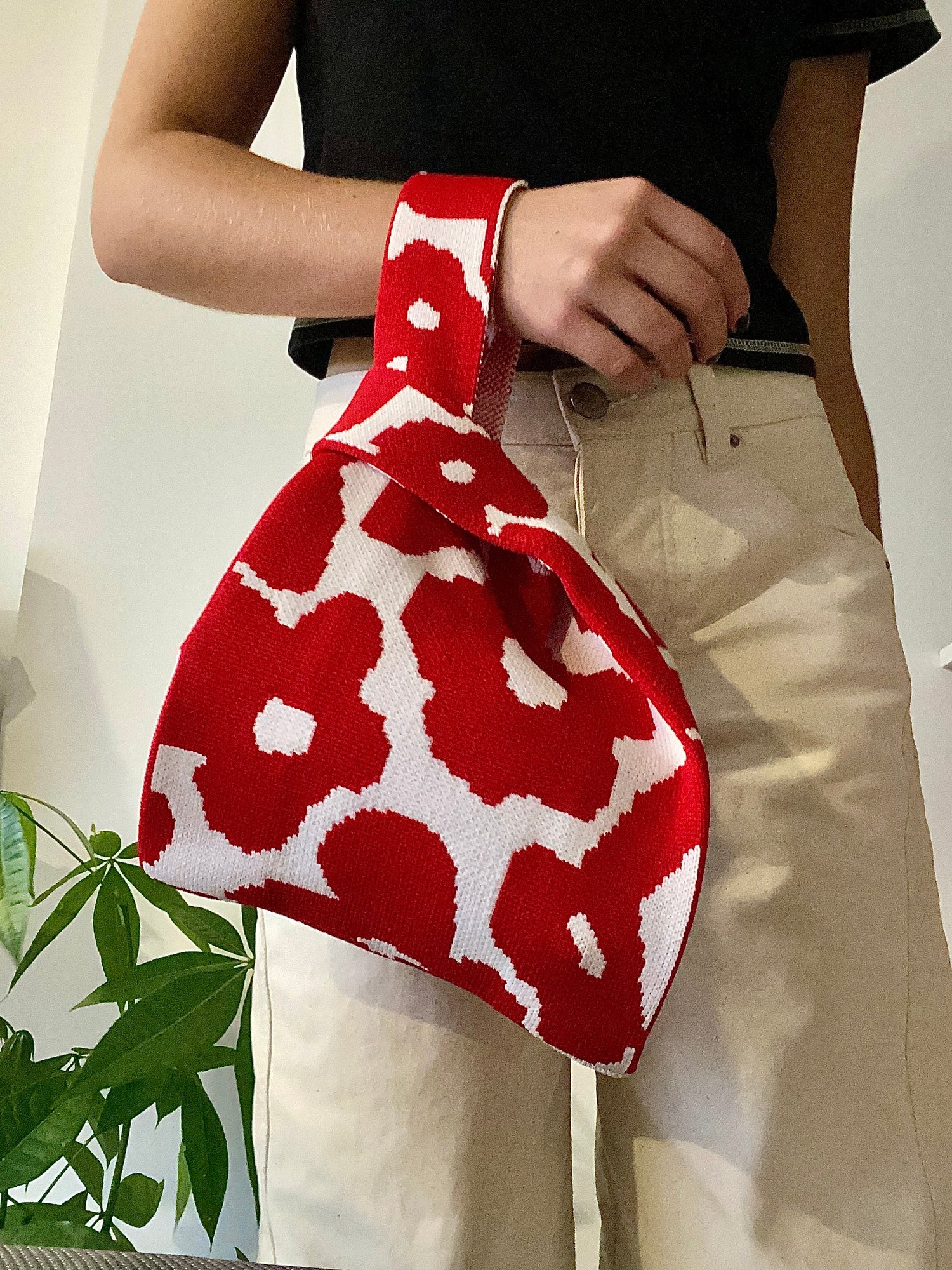 ollection of stylish bags with different textures and patterns, retro-inspired accessories by Party People.