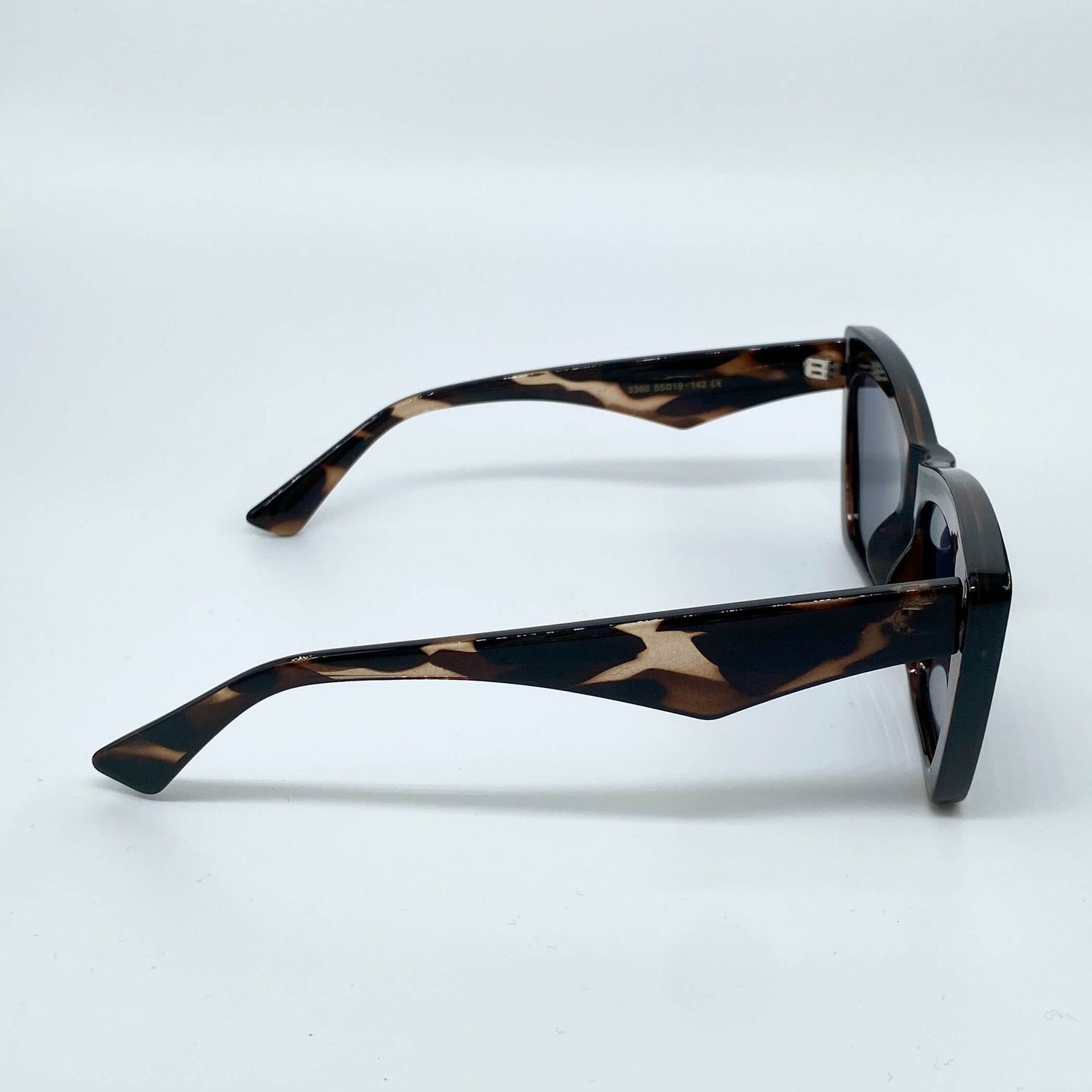 Carlita Sunglasses | Sharp Angular Cat-Eye Frames