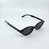 Kayla slim oval sunglasses with a vintage printed frame and tinted lenses for a retro 90s urban look - Party People