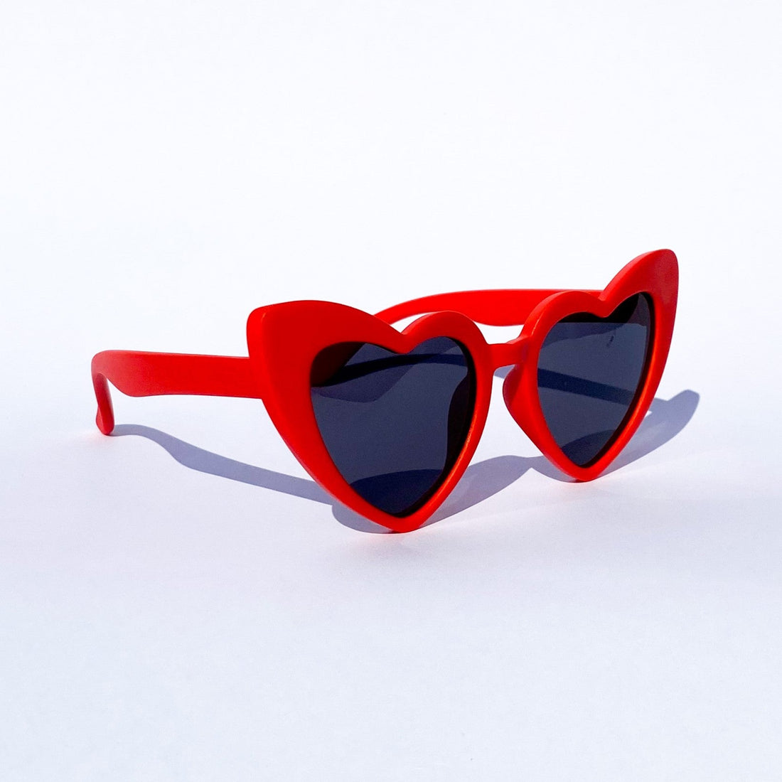 Ladybug round kids sunglasses with a chunky-profile frame and dark lenses for a playful and durable everyday look - Party People